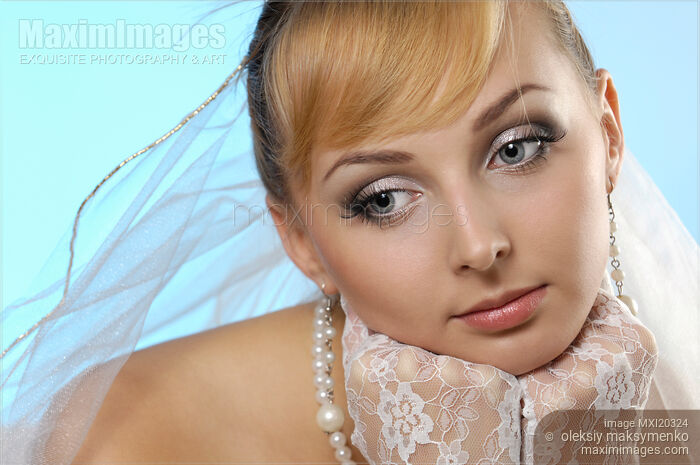 Stock photo of Young bride with thoughtful face Buy commercial use license at MaximImages