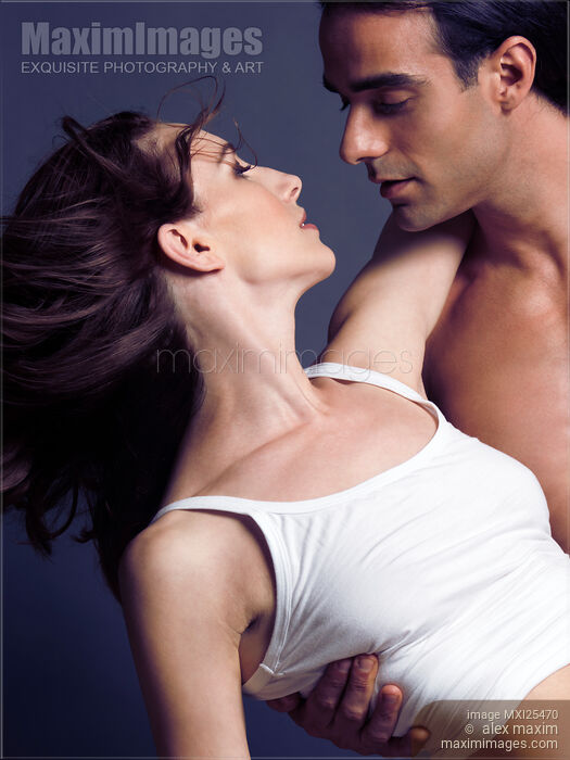 Young couple about to kiss Stock photo of Young couple about to kiss Buy commercial use license at MaximImages