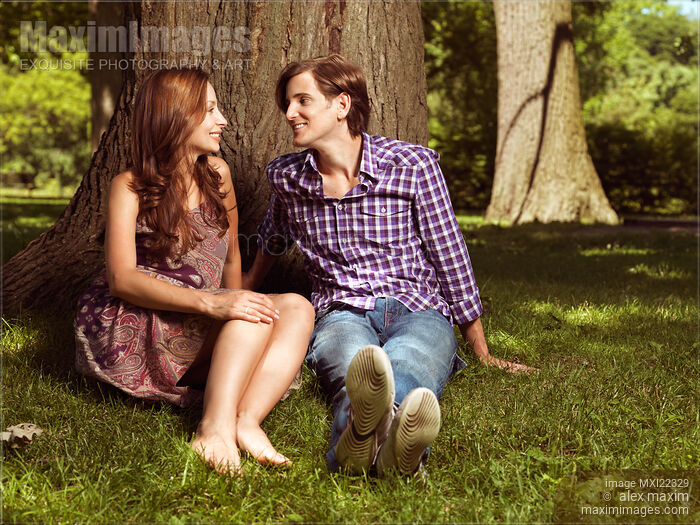 Young Happy Couple in a Park Stock Image MXI22329 © Alex Maxim / MaximImages