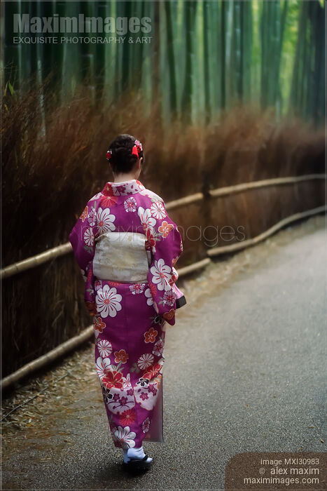 Young Japanese woman in kimino walking along Arashiyama bamboo forest in Kyoto Stock photo of Young Japanese woman in kimino walking along Arashiyama bamboo forest in Kyoto Buy commercial use license at MaximImages