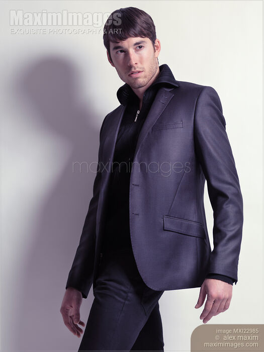 Young Man Wearing Black Blazer Stock photo of Young Man Wearing Black Blazer Buy commercial use license at MaximImages