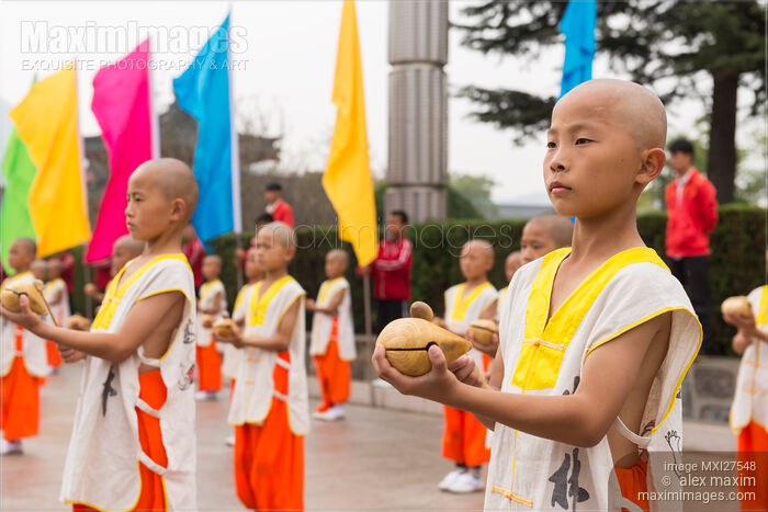 Stock photo of Young Shaolin Kung Fu students in DengFeng China Buy commercial use license at MaximImages