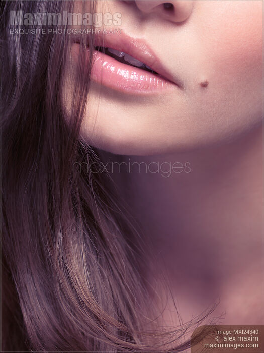 Young woman closeup of lips Stock photo of Young woman closeup of lips Buy commercial use license at MaximImages