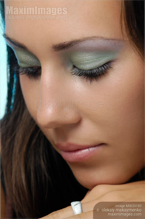 Stock photo of Young Woman Face Buy commercial use license at MaximImages
