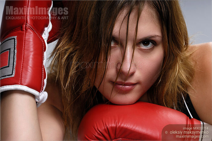 Young Woman Kickboxer Stock photo of Young Woman Kickboxer Buy commercial use license at MaximImages