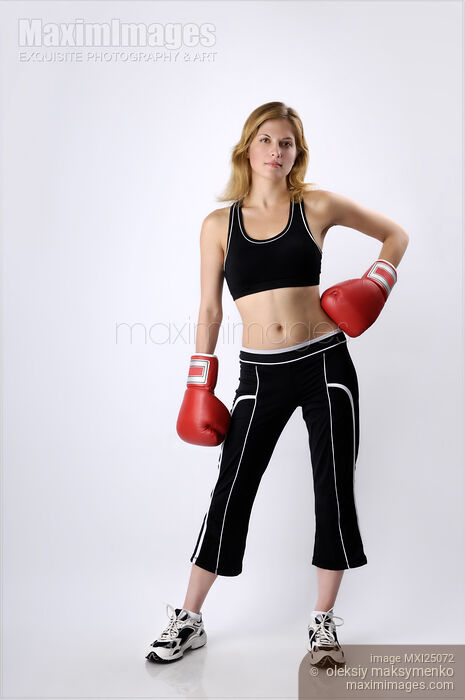 Young Woman Kickboxer Stock photo of Young Woman Kickboxer Buy commercial use license at MaximImages