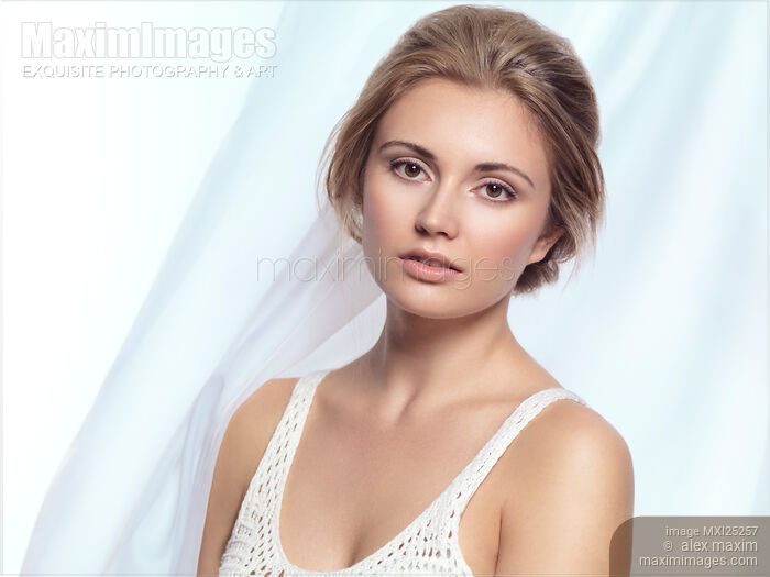 Stock photo of Young woman natural look beauty portrait Buy commercial use license at MaximImages