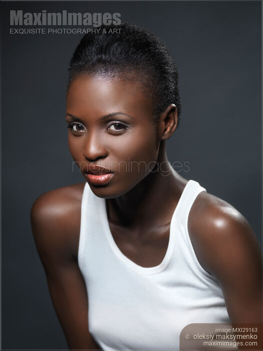 Stock photo of Young Woman Portrait Buy commercial use license at MaximImages