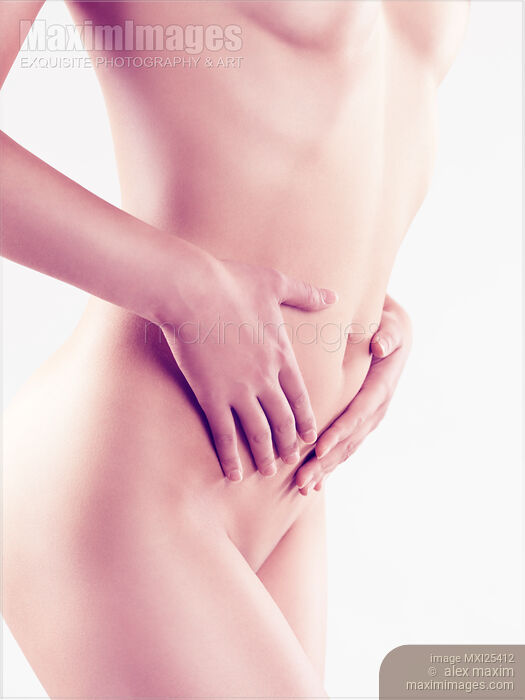 Young woman slim naked body closeup Stock photo of Young woman slim naked body closeup Buy commercial use license at MaximImages