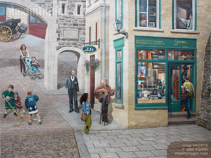 Stock photo of Young woman standing by the wall mural La Fresque des Québécois in Old Quebec City Buy commercial use license at MaximImages