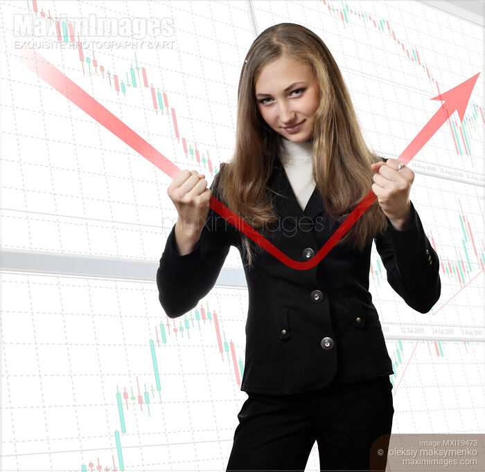 Young woman student of economics changing financial trend Stock photo of Young woman student of economics changing financial trend Buy commercial use license at MaximImages