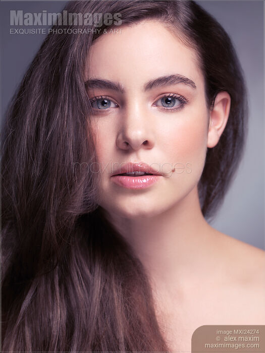 Young woman with gray eyes beauty portrait Stock photo of Young woman with gray eyes beauty portrait Buy commercial use license at MaximImages