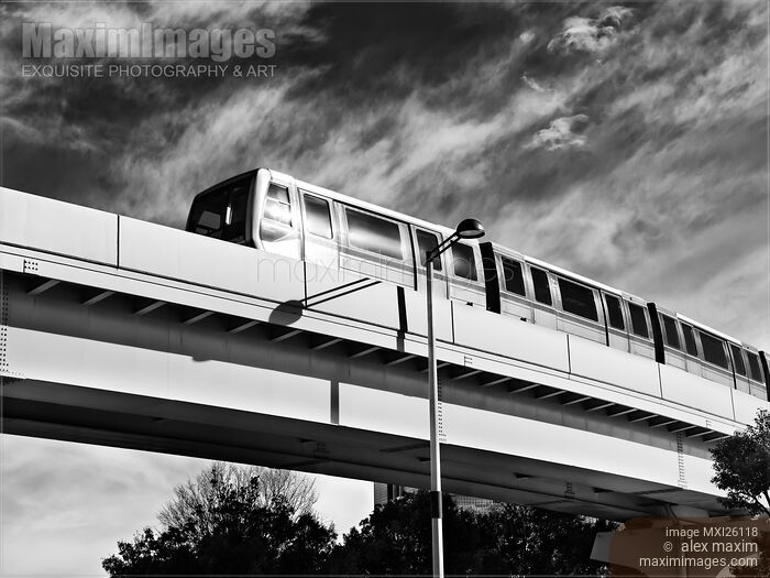Stock photo of Yurikamome train on elevated railway in Odaiba Tokyo Black and white Buy commercial use license at MaximImages