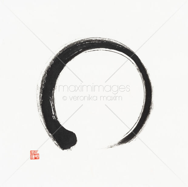 Zen Sumi-e painting of black Enso circle on white